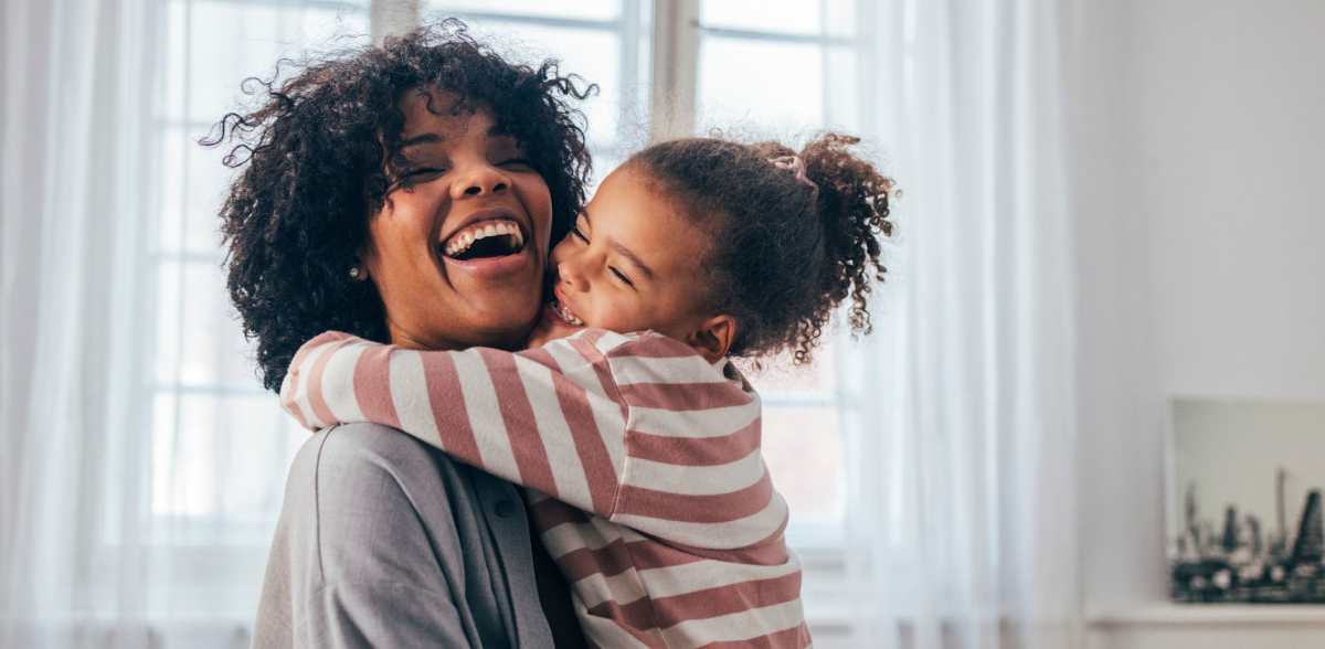 A mother and daughter hug at CovePointe at The Landings, Norfolk, Virginia