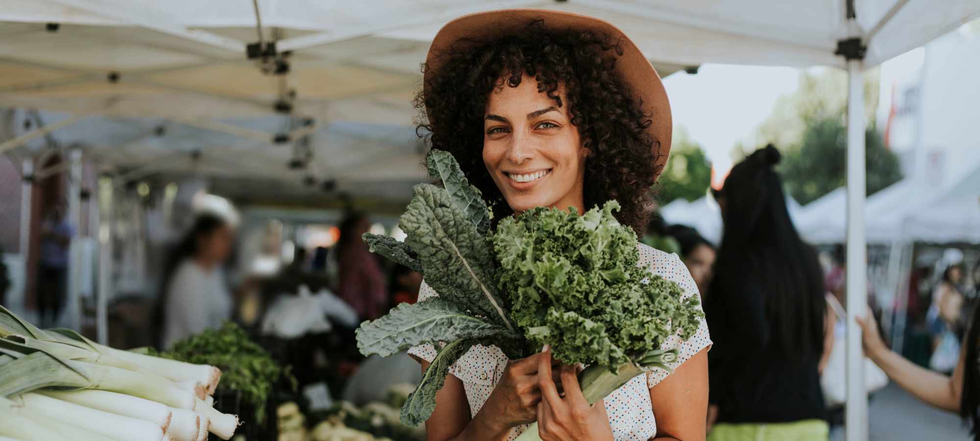 Resident buying vegetables near Wellington Apartments in Silverdale, Washington