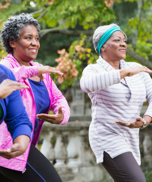 Residents doing tai chi at Vancouver Pointe in Vancouver, Washington.