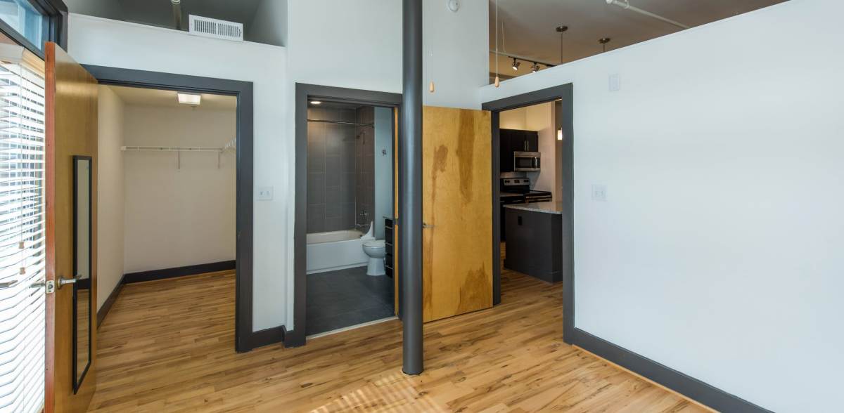 Open industrial-style apartment with plank-wood floor at Scotts Edge, Richmond, Virginia