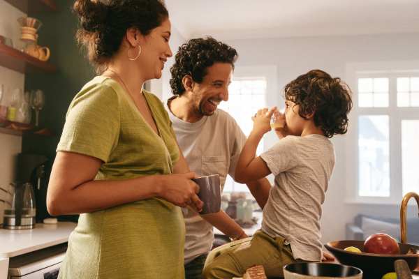 Family in the kitchen at Polo Run Apartments in Stockton, California