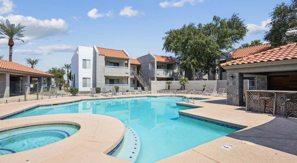 Swimming pool and spa beside the clubhouse at Paseo Park