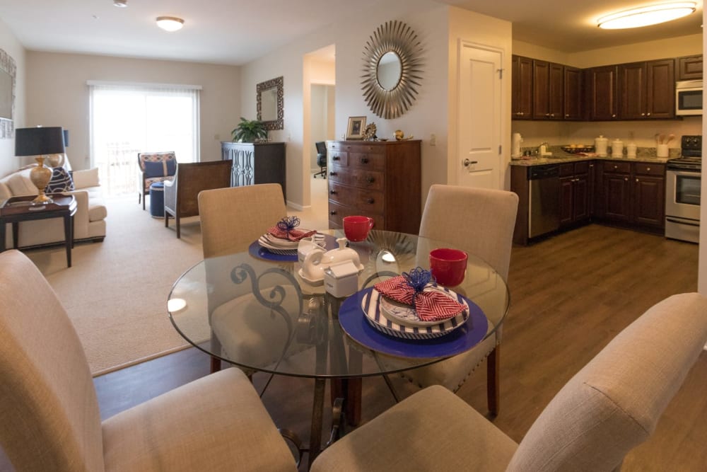 A decorated dining room table in an apartment at Harmony at Independence in Virginia Beach, Virginia
