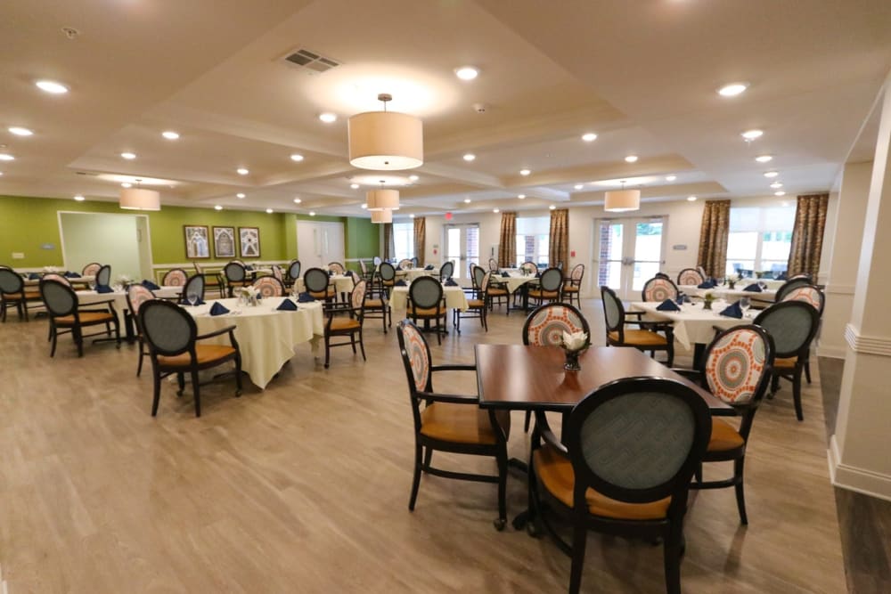 Set dining room tables at Harmony on the Peninsula in Yorktown, Virginia