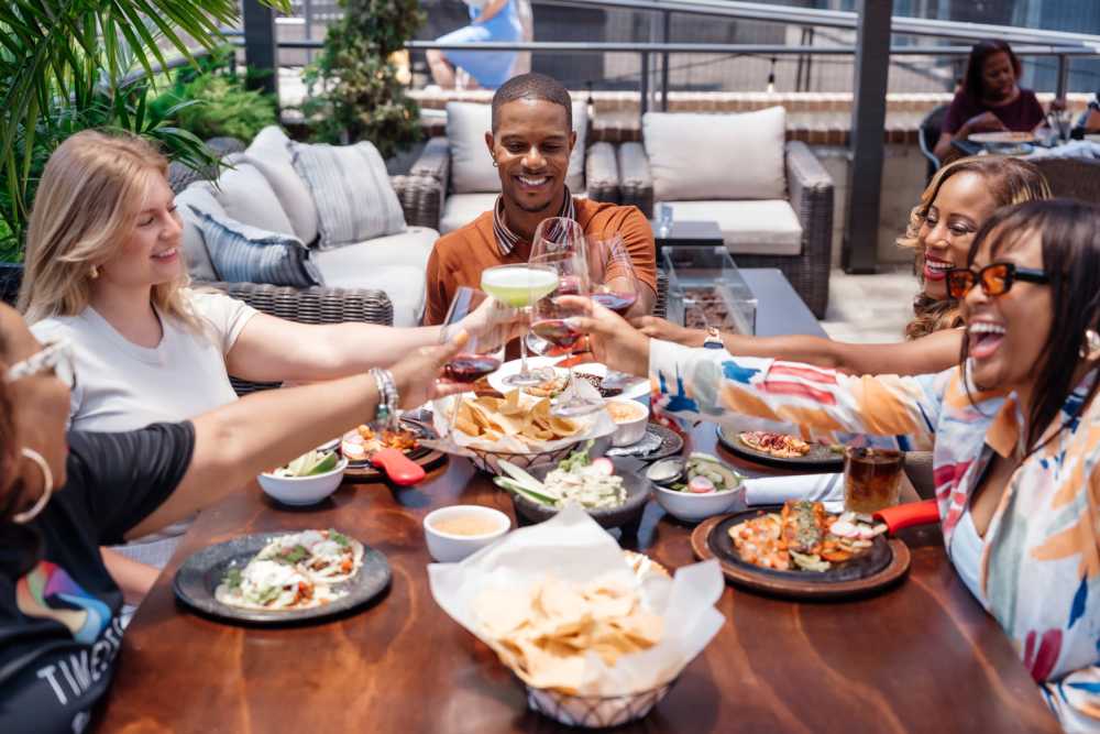 Residents eating near Saylor at Southside Trail in Atlanta, Georgia