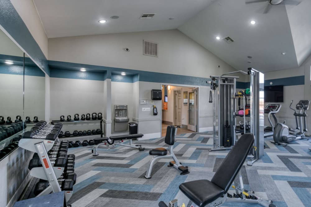 A well-equipped fitness center at Copper Beech Town Homes in Clovis, California
