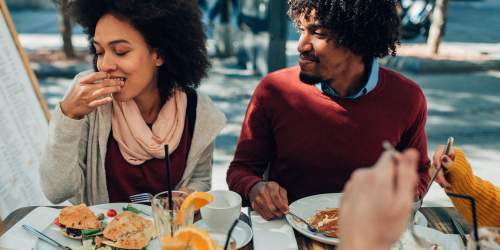  Friends having food at restaurant near Country Views Apartments in Fallbrook, California