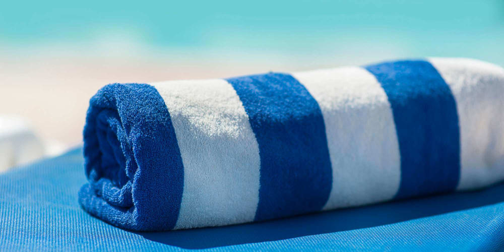 Beach towel at Olea Beach Haven in Jacksonville, Florida
