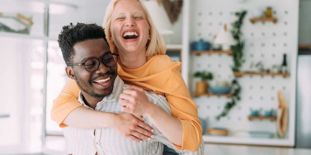 Roommates loving their new home together at Central West End Apartments in Saint Louis, Missouri