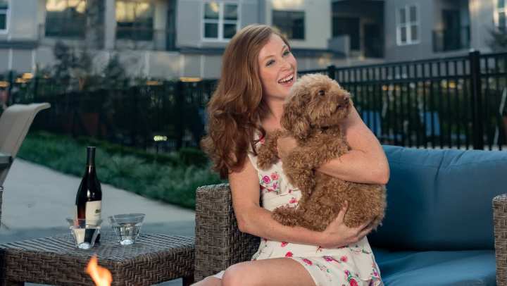Resident with her pet dog