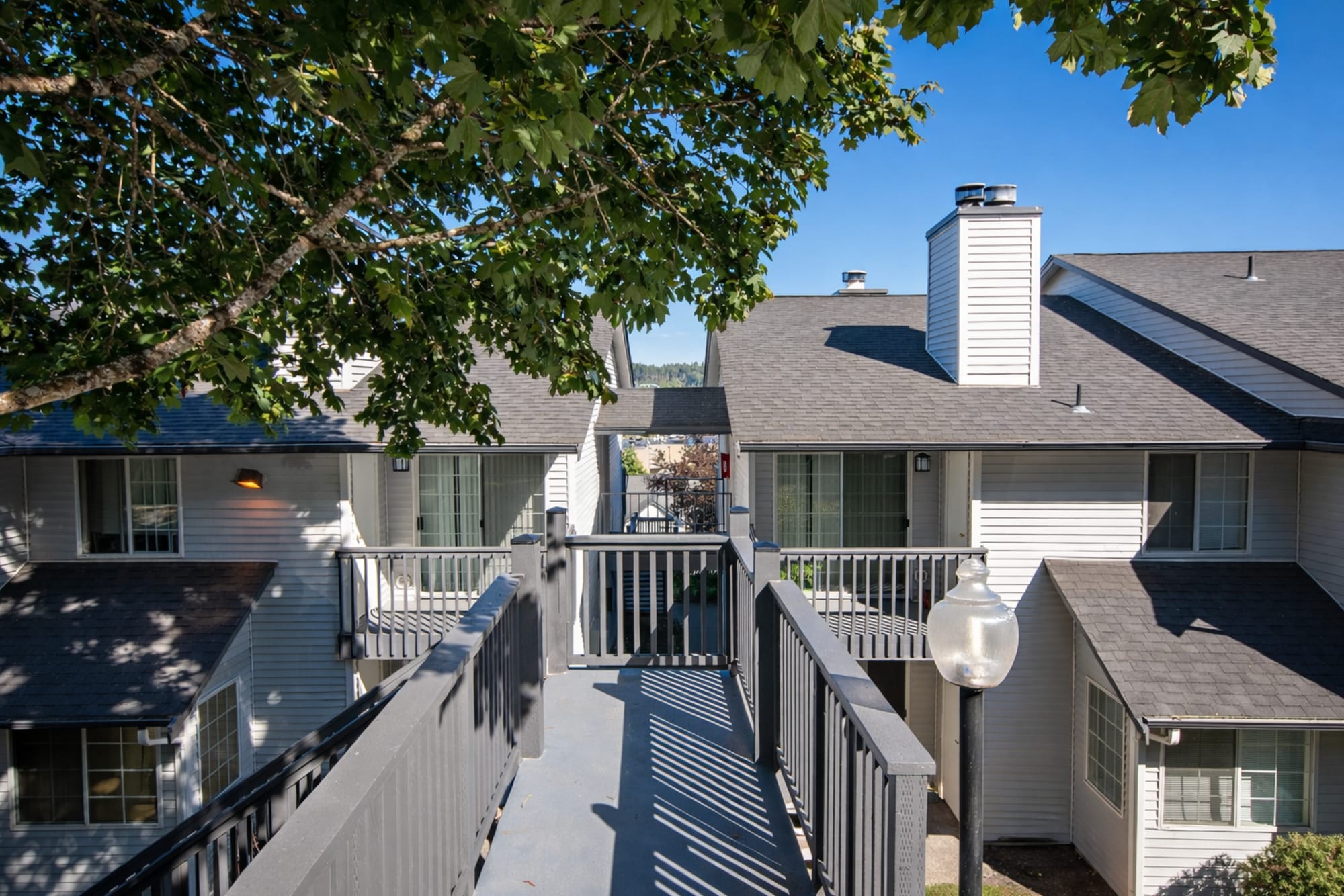 Exterior shot of the entrance at Wellington Apartments in Silverdale, Washington