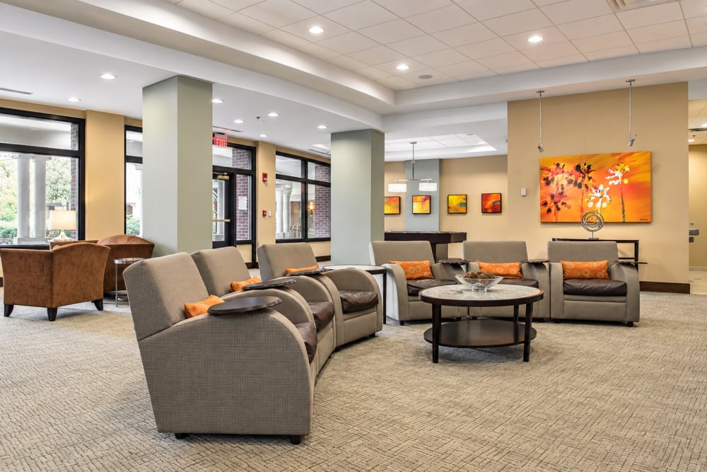 Community gathering spaces with a fireplace at Crescent Centre Apartments & Townhomes in Louisville, Kentucky