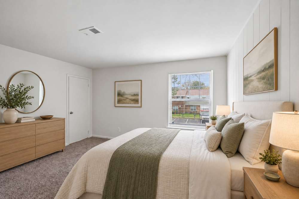 Spacious staged bedroom at The Fairways Apartment Homes in Blackwood, New Jersey