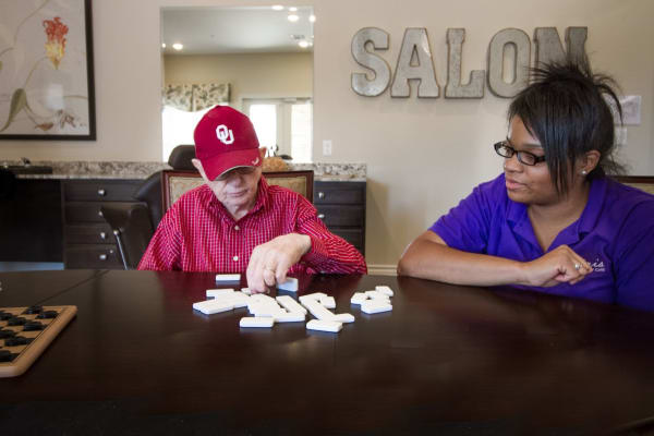 Residents playing a game at Iris Memory Care in Edmond, Oklahoma