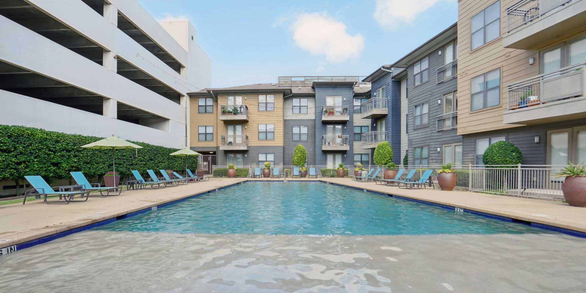 Apartments at Oaks 5th Street Crossing at City Station in Garland, Texas