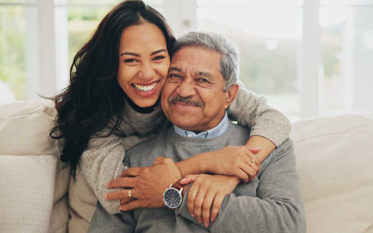 Senior resident with his daughter at Huntington Place in Trumbull, Connecticut