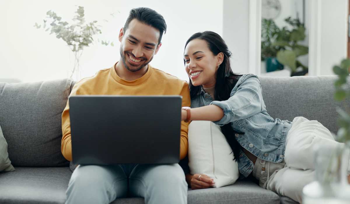 Couple checking internet at Iris Gardens in Azusa, California