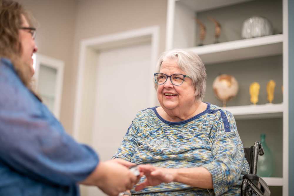 Resident in Care Suite  at Vista Prairie at Windmill Ponds in Alexandria, Minnesota