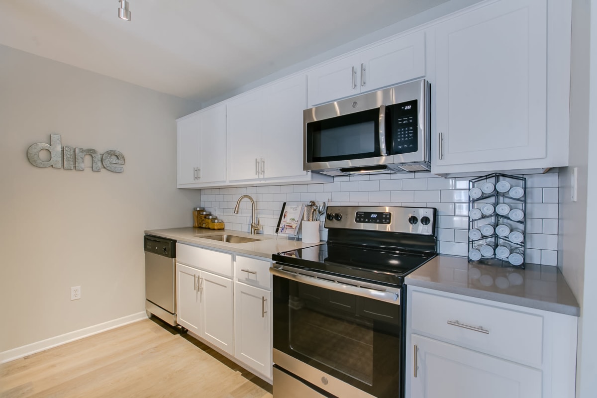 A kitchen with plenty of cabinet space at Minneapolis from your living room at Loring Park Apartments in Minnesota