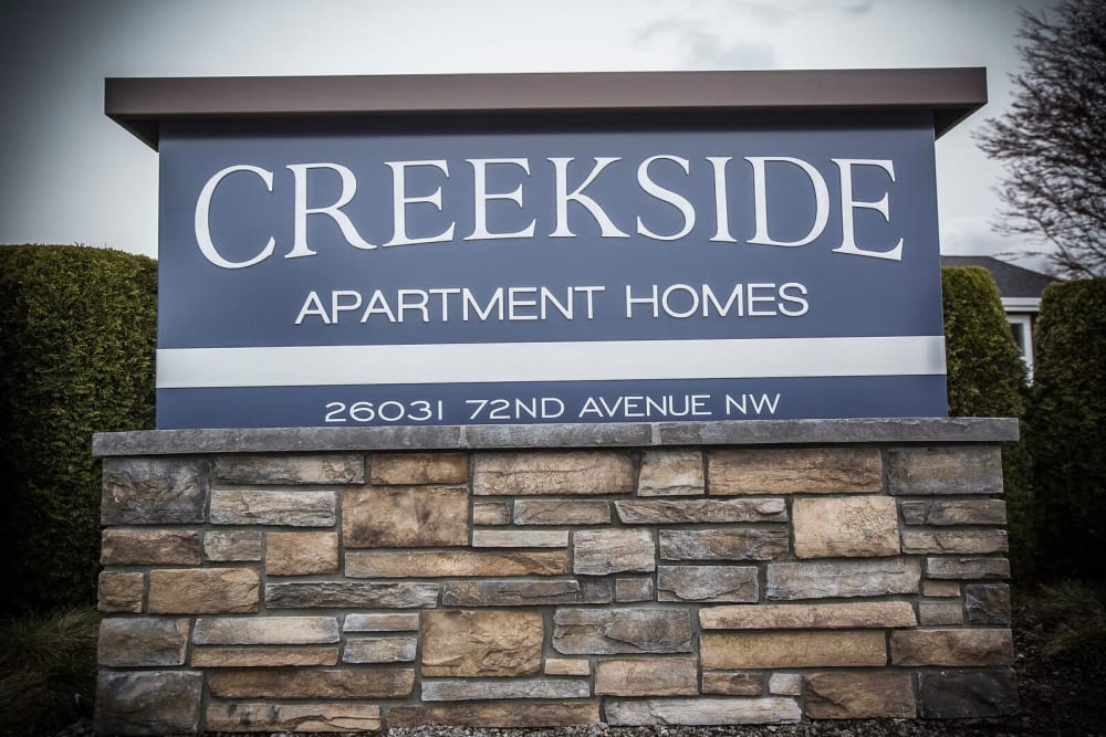 Front entrance sign at Creekside Apartment Homes in Stanwood, Washington