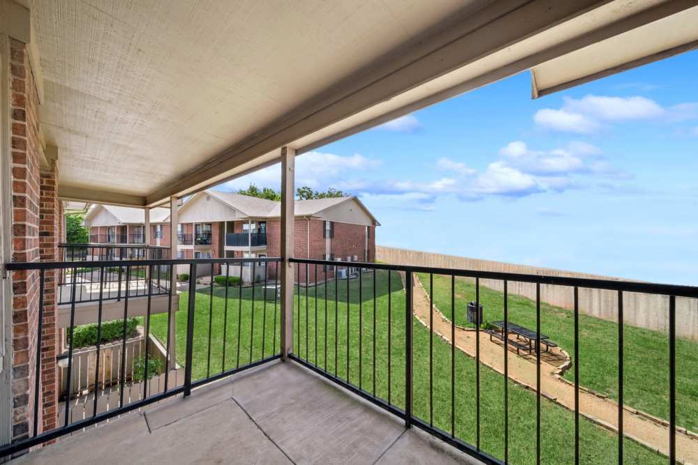 Private balcony at Oxford Oaks Apartments in Edmond, Oklahoma