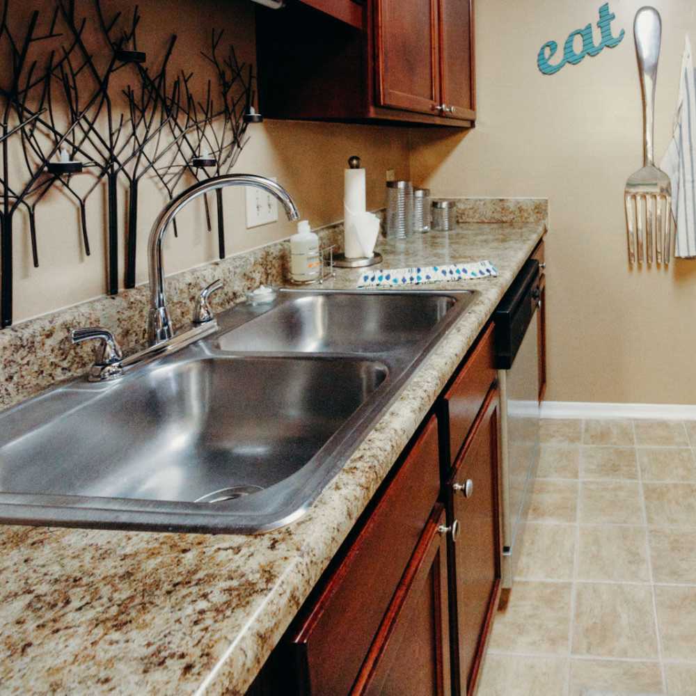Stainless steel appliances in the modern kitchen at Tapestry on Vaughn in Montgomery, Alabama,  