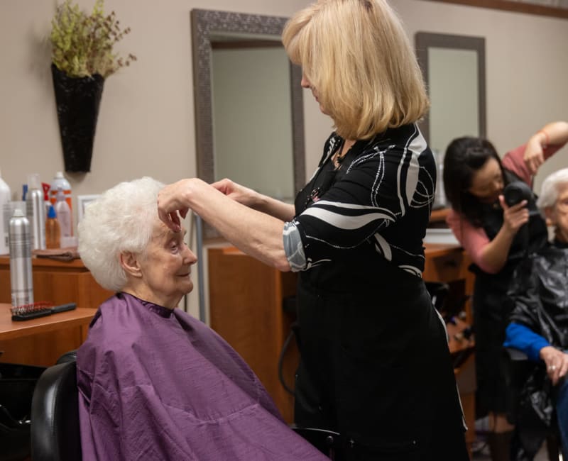 A resident getting her hair cut at Towerlight in St. Louis Park, Minnesota. 