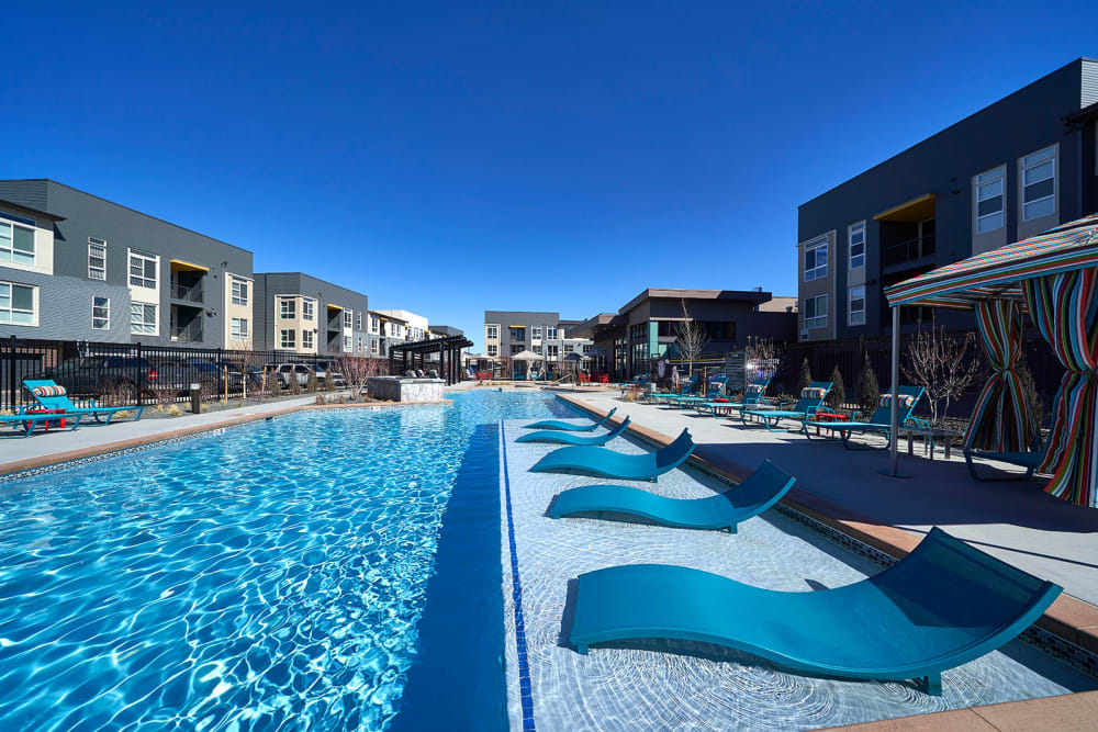 Resort-style swimming pool at Encore Evans Station in Denver, Colorado