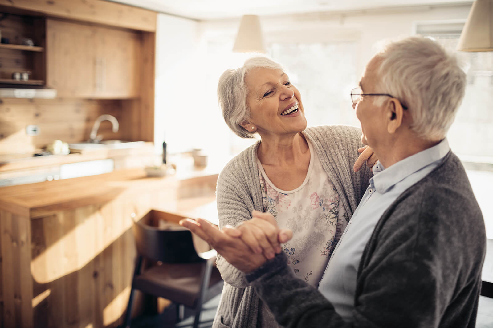 Senior woman dancing with her partner at Anthology Senior Living in Chicago, Illinois
