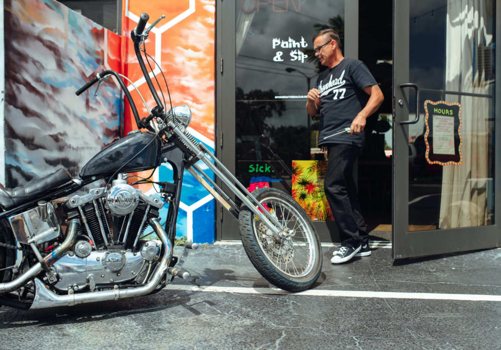 Resident walking out to his motorcycle at Motif in Fort Lauderdale, Florida