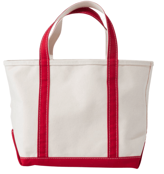A red and natural color canvas tote with two handles, a zipper enclosure and a reinforced flat canvas bottom.