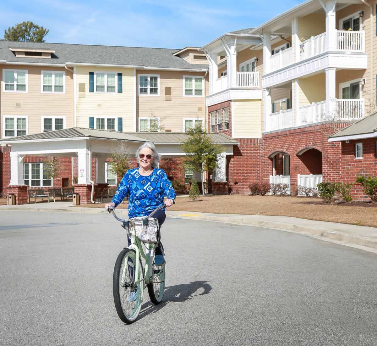 Resident riding a bike near Harmony at Morning Grove in Memphis, Tennessee
