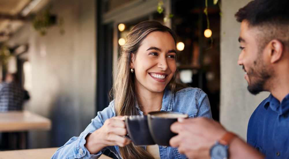Friends enjoying their coffee at a restaurant near Alicia Park in Laguna Niguel, California