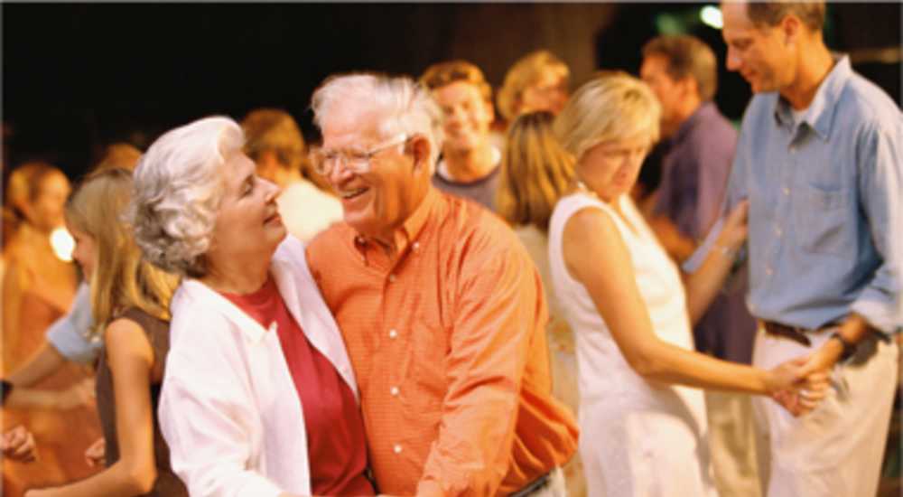 Residents dancing near Olive Tree Terrace in West Covina, California