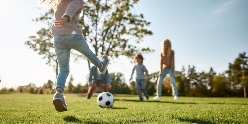 playing soccer at a park near Midway Park in Lemoore, California