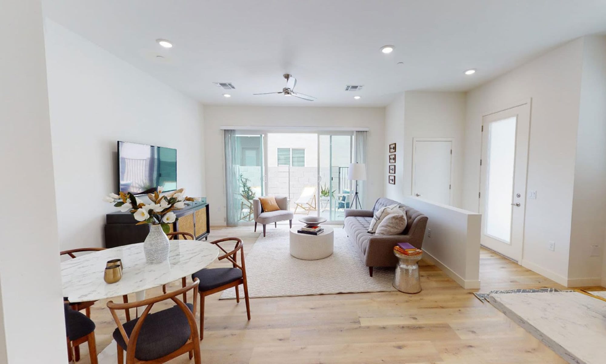 Open living room with natural light at Novella at Biltmore in Phoenix, Arizona