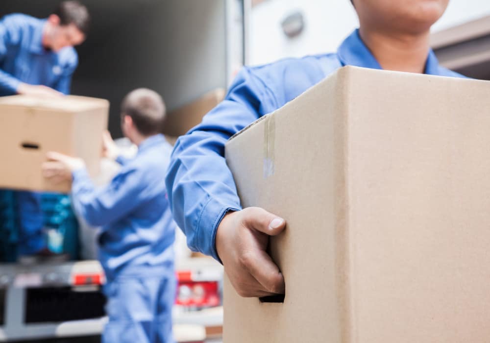 Team moving boxes at American Self Storage