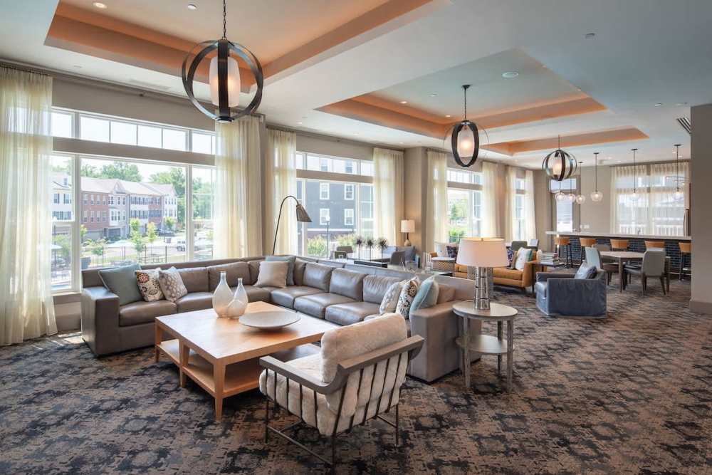 Club house with kitchen and seating at  The Elms at Signal Hill Station in Manassas, Virginia