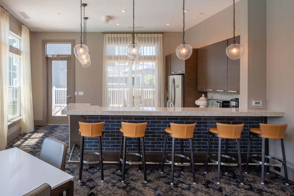 Community kitchen area for entertaining at  The Elms at Signal Hill Station in Manassas, Virginia