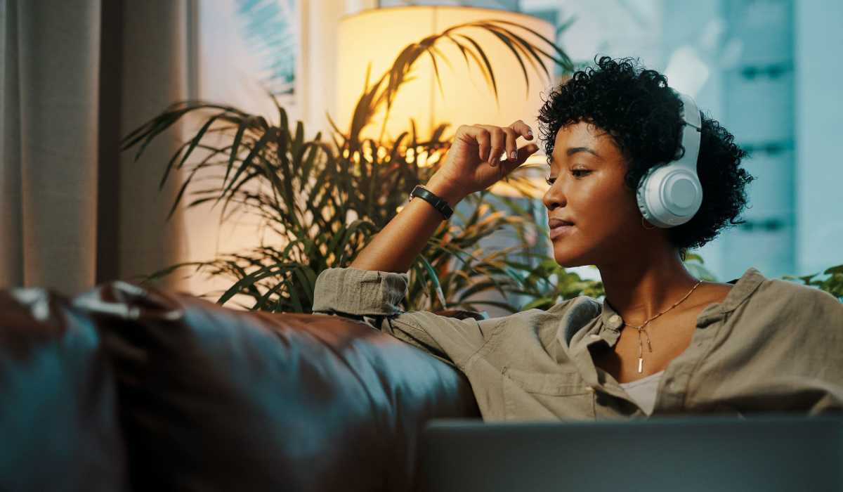 A resident listens to music in her apartment at Commons on Potomac Square, Sterling, Virginia