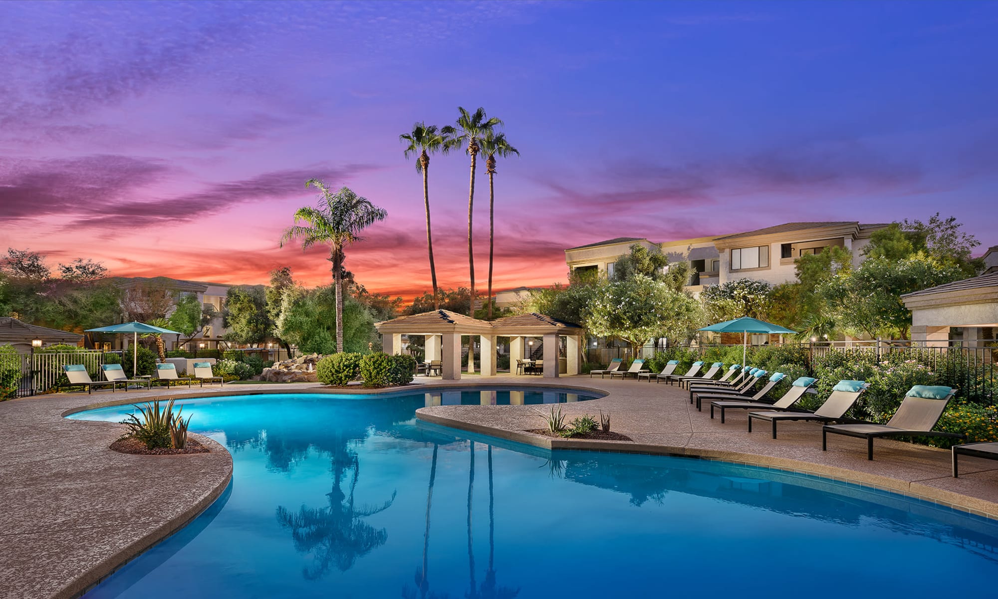 Resort-inspired swimming pool at Waterside at Ocotillo apartments in Chandler, Arizona