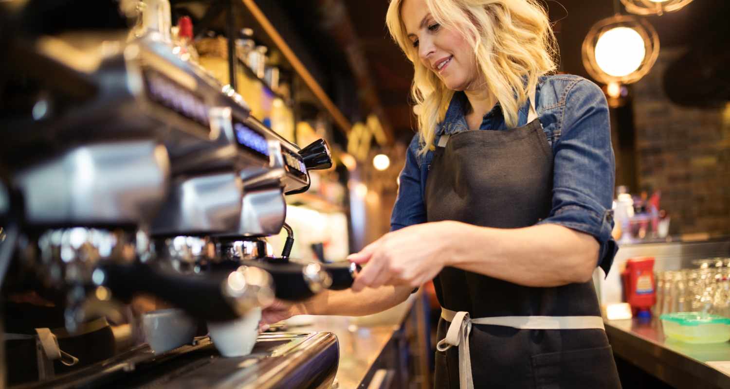 Barista making coffee drinks at a café near Park Circle Village in North Charleston, South Carolina