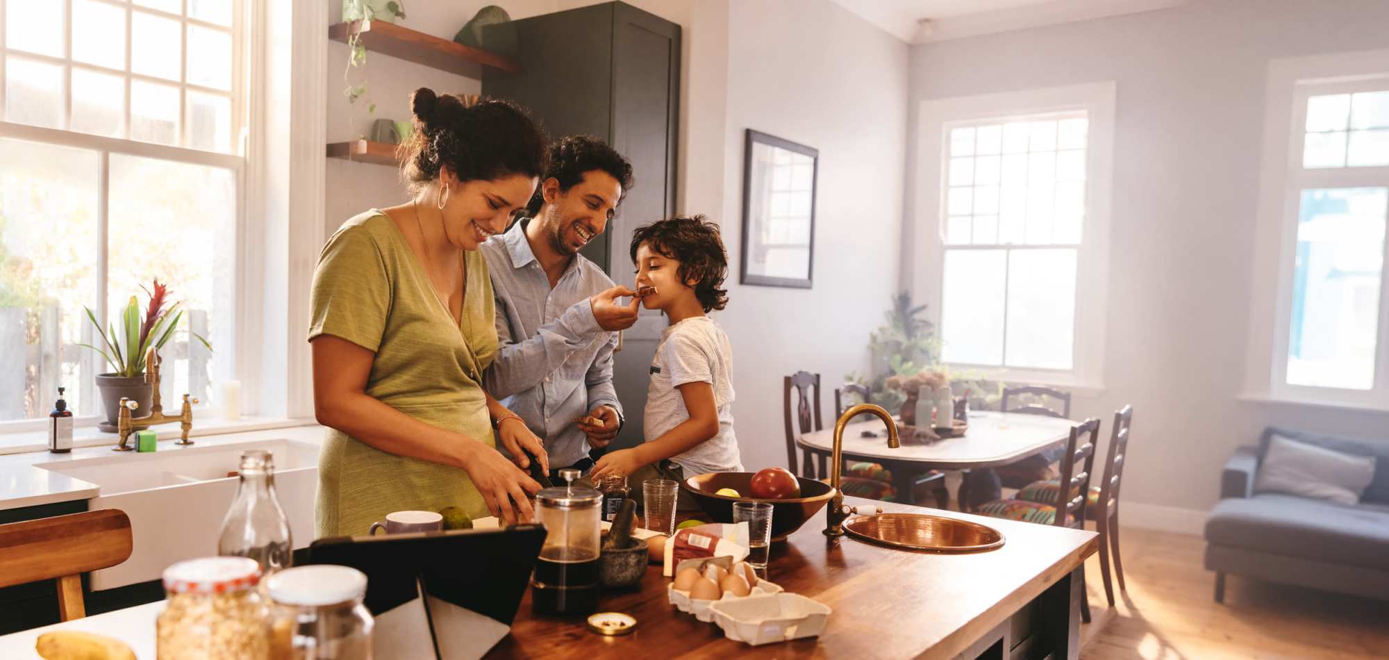 A family prepares a meal in their kitchen at Magnolia Chase, Virginia Beach, Virginia