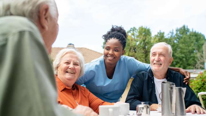 A group of people sitting at a table