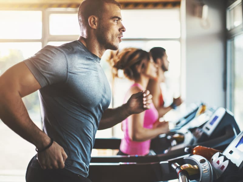 Residents staying in shape in the fitness center at Sentio in Phoenix, Arizona