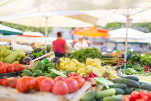 A produce stand in a farmers market near Mariposa at River Bend in Georgetown, Texas