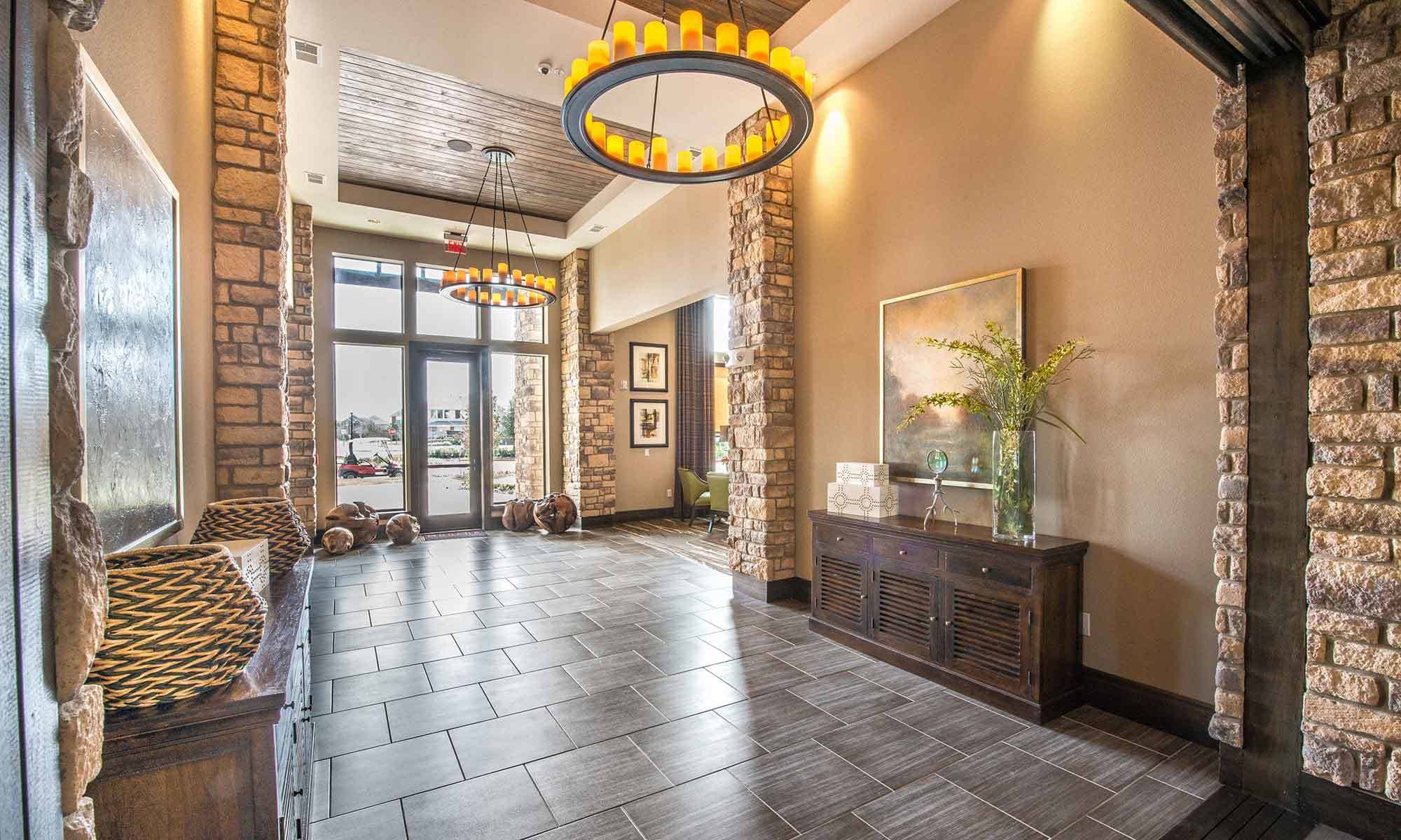 Interior view of the beautifully decorated leasing center at The Abbey at Spring Town Center