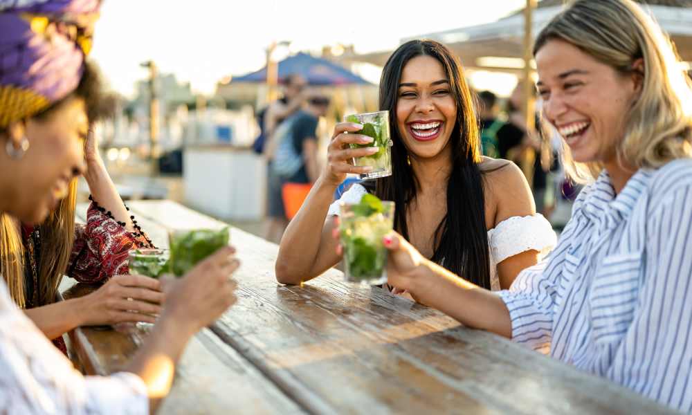 Residents enjoying at gathering with drinks near Keystone Trailhead Village in Reno, Nevada