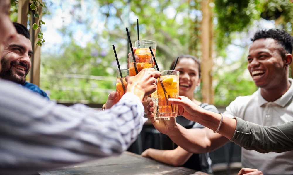 Residents having drinks near MeadowView Townhomes in Goshen, Ohio