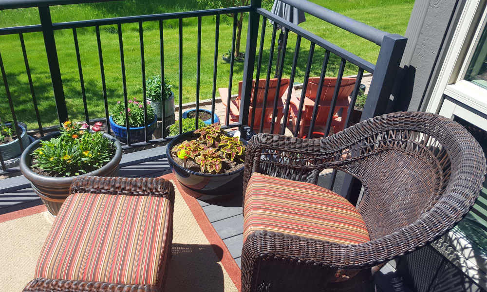 Wicker chair and ottoman on balcony at Prince Frederick Villas in Prince Frederick, Maryland